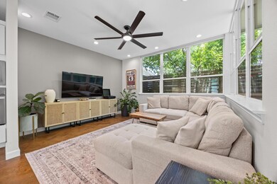 Living area with ceiling fan, recessed lighting, 