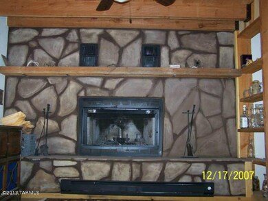 Cozy Stone Fireplace in Living Room