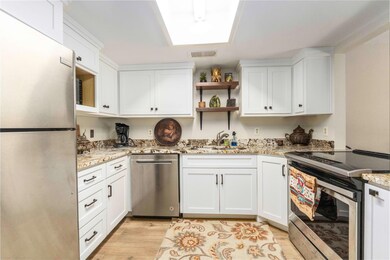 Kitchen featuring appliances with stainless steel