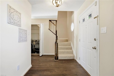 LVP flooring starts at the entryway and leads to the family room.