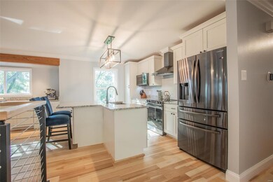 New kitchen with granite countertops, shaker cabin