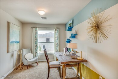 Office area featuring carpet flooring