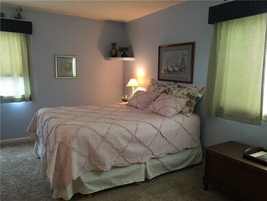 The extra large bedroom easily accomodates a queen