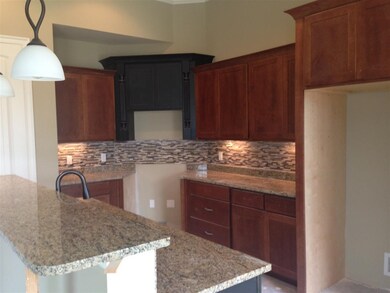 Custom Cabinets Granite counter tops and Glass Til