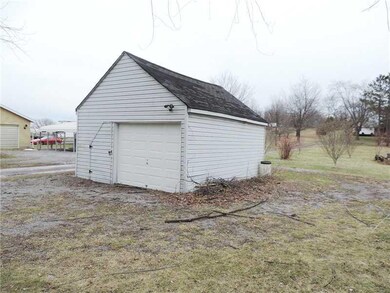 Parking Lot/Garage. Oversized 1 car garage with lo