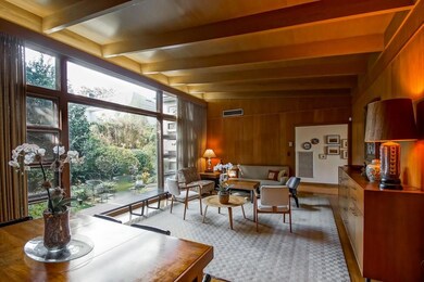 LIVING / DINING AREA OPEN TO GARDEN.