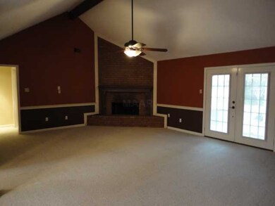 Plentry of space in this vaulted great room with a