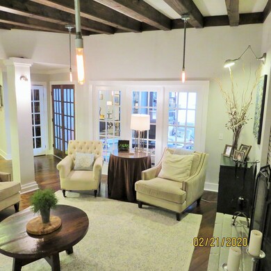 Double Doors exit to Sunroom