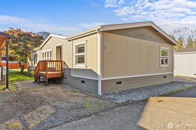 Front left of home with parking