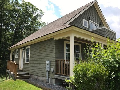 Side view of cottage with separate...