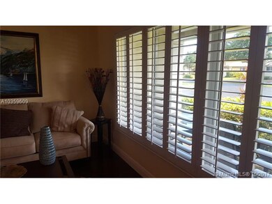 PLANTATION SHUTTERS ON HURRICANE IMPACT WINDOWS