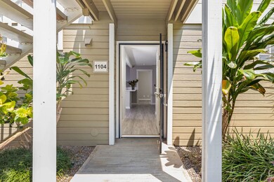 Garden entry to corner-unit Elima Lani # 1104.