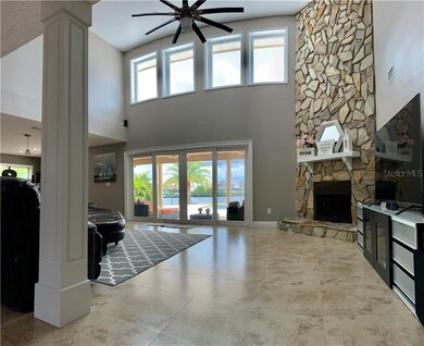 Living Room w/ 18' Ceilings