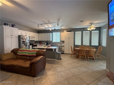 Kitchen with appliances with stainless steel finis
