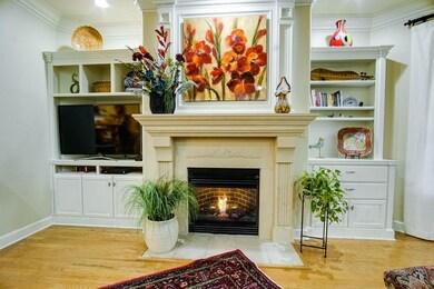 Gas fireplace with built in shelving and entertain
