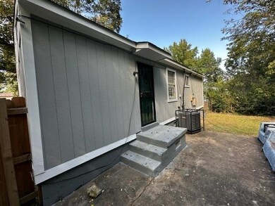 View of home's exterior featuring a patio and cent