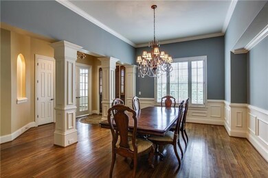Dining room off of open foyer.