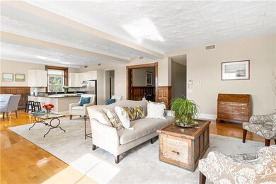 Spacious living area to open kitchen.