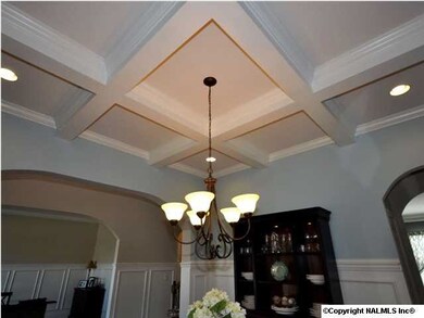GORGEOUS COFFERED CEILING ACCENTS THE DINING SPACE!