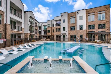 View of pool with pool water feature