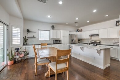 Kitchen featuring stainless steel appliances, whit