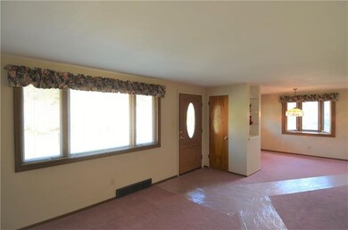 Living room with large picture window, new front d
