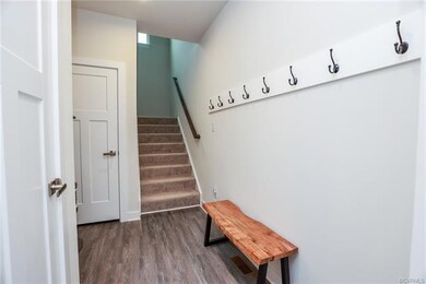The Foyer Hallway leads into a Drop zone area with