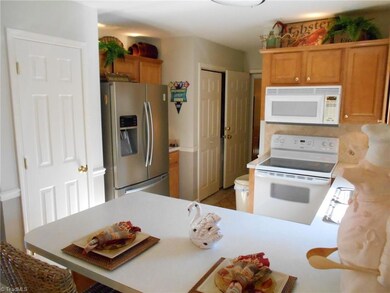 Kitchen with pantry and laundry on main