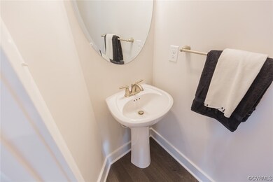 The entry offers an office w/ glass French doors,