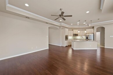 Living Room overlooking into Open Concept Kitchen