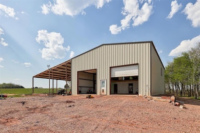 Garage featuring a detached garage