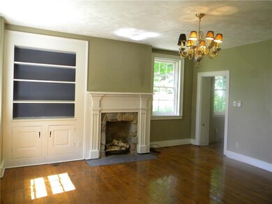 Dining room with deco fireplace and built in china