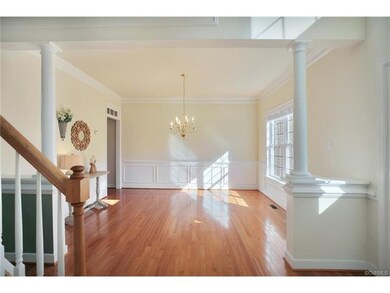 Sunny foyer opens into cheery, spacious dining roo
