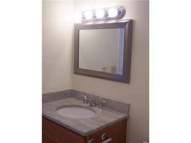 Bathroom. NEW CABINETS,LIGHTING FIXTURE,MIRROR AND