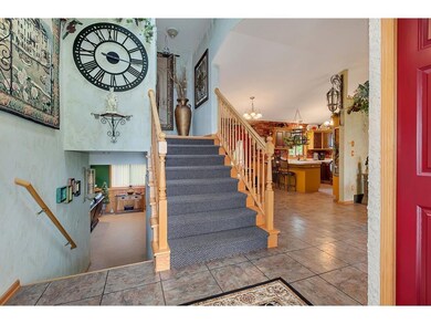 Walk in to the large foyer with coat closet and op