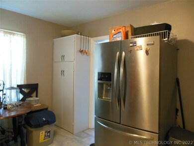 Built in pantry cabinet.  Refrigerator can stay-wo