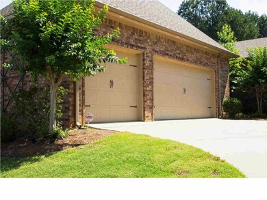 A double garage door plus a single.