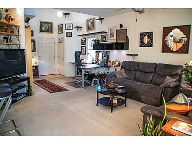 Living Room. Features ceiling fan