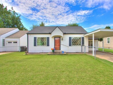 View of front of property featuring a front yard a