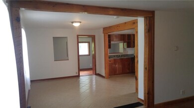 Dining room with ceramic tile, gorgeous oak beam a