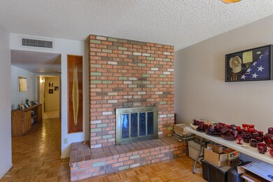 Formal dining room (dual fireplace)