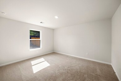 The primary bedroom is a great place to relax afte