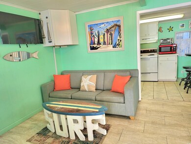 Living area featuring light wood-style floors