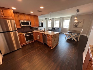 Upscale Kitchen, Dining & Living Room