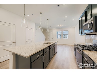 Grand Kitchen Island with upgraded appliances and soft close cabinetry.