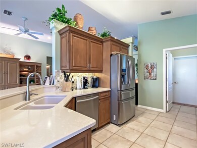 Quarts counter tops, stainless appliances and kitchen just off the breakfast room