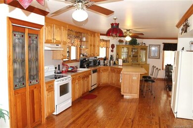 Beautiful Spacious and Updated Kitchen with tons of cabinets, pantry, Breakfast Bar, Lovely Hardwoods