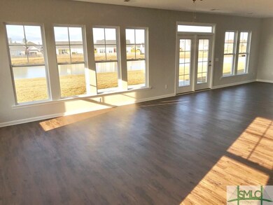 Spacious & open floor plan with lots of windows to
