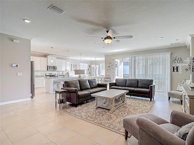 Great Room - Sliding Doors to Patio - Kitchen - Dining Room