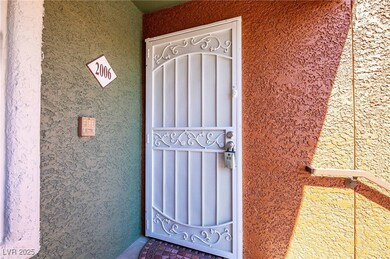 View of exterior entry with stucco siding